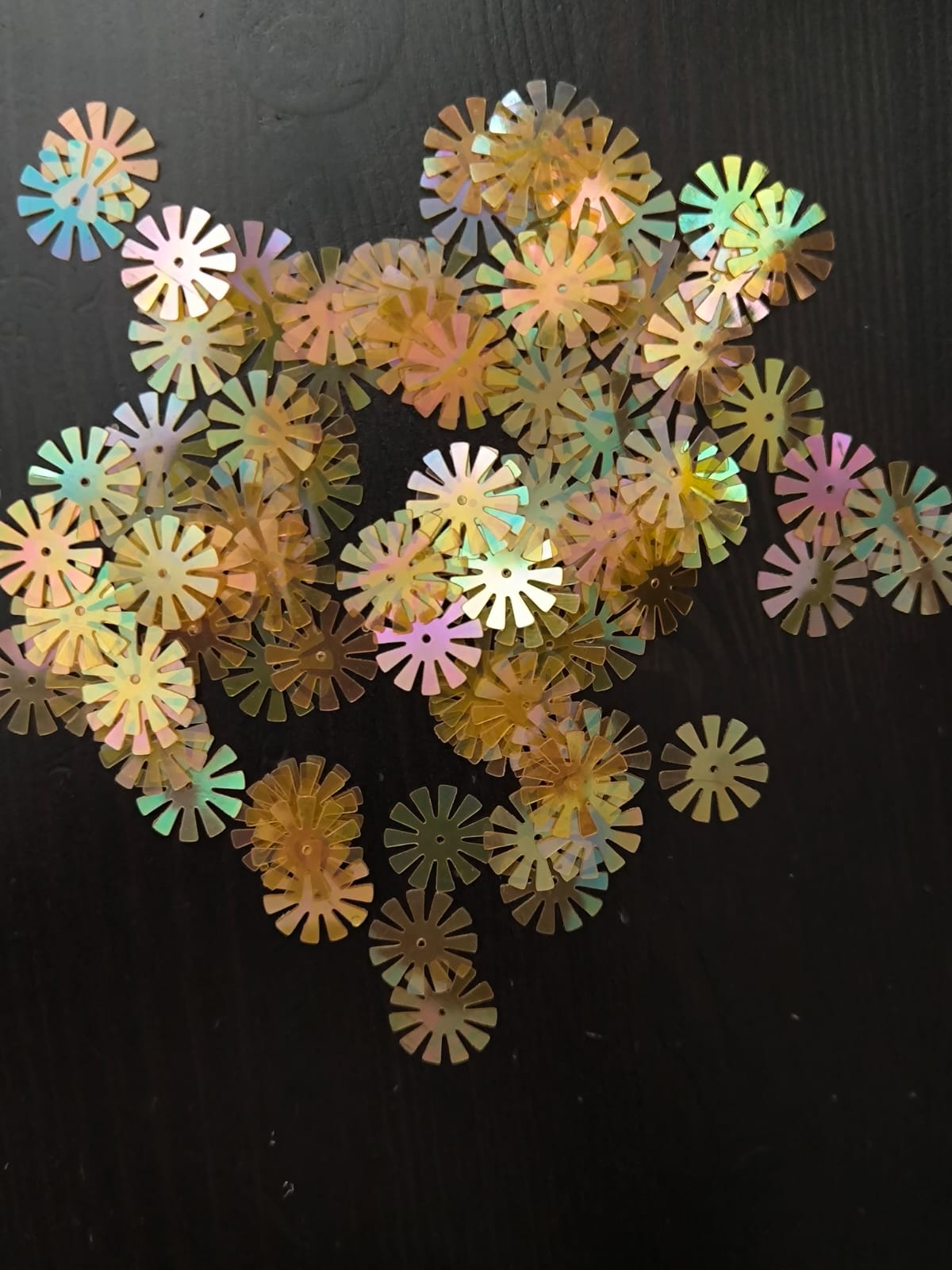 Paillettes fleurs soleil orange transparent 15 mm