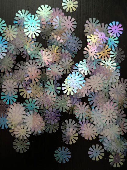 Paillettes fleurs soleil transparent blanc irisé 15 mm