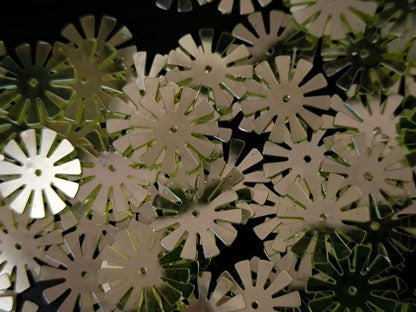 Paillettes fleurs soleil vert pistache miroir 15 mm