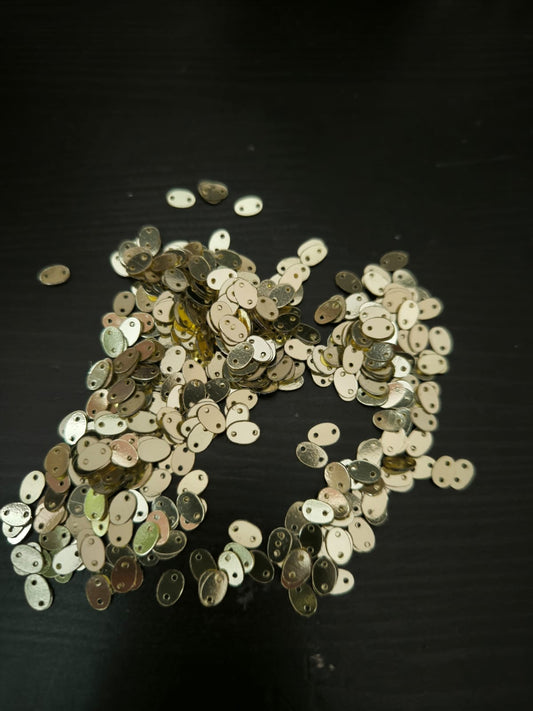 Sequin ovales dores 6mm 1