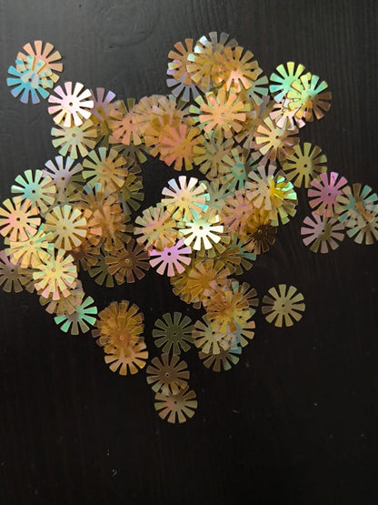 Paillettes fleurs soleil orange transparent 15 mm