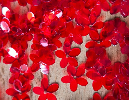 Paillettes petites fleurs rouges 9 mm