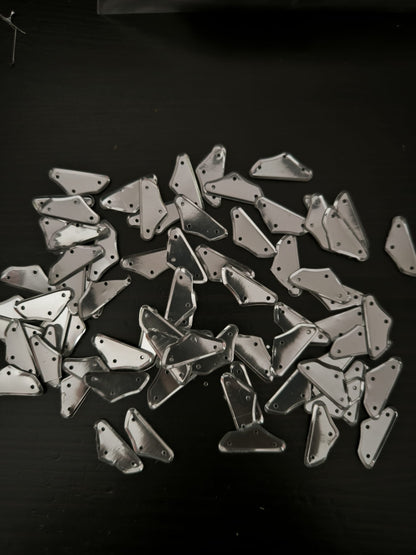 Paillettes polygones argentées brillantes 20x7 mm