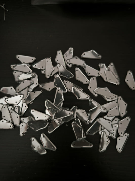 Paillettes polygones argentées brillantes 20x7 mm