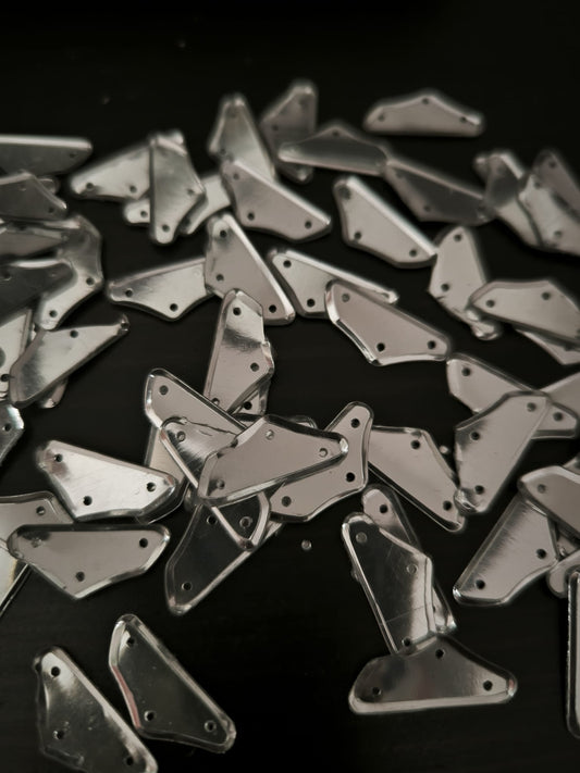 Paillettes polygones argentées brillantes 20x7 mm